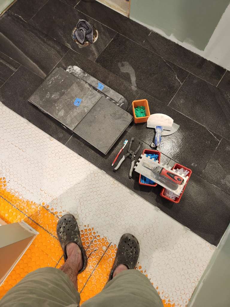 Waterproofed shower niche detail winter construction custom bathroom maine
