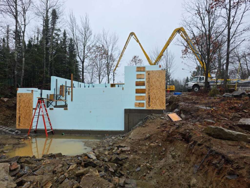 Foundation layout survey winter construction phillips maine