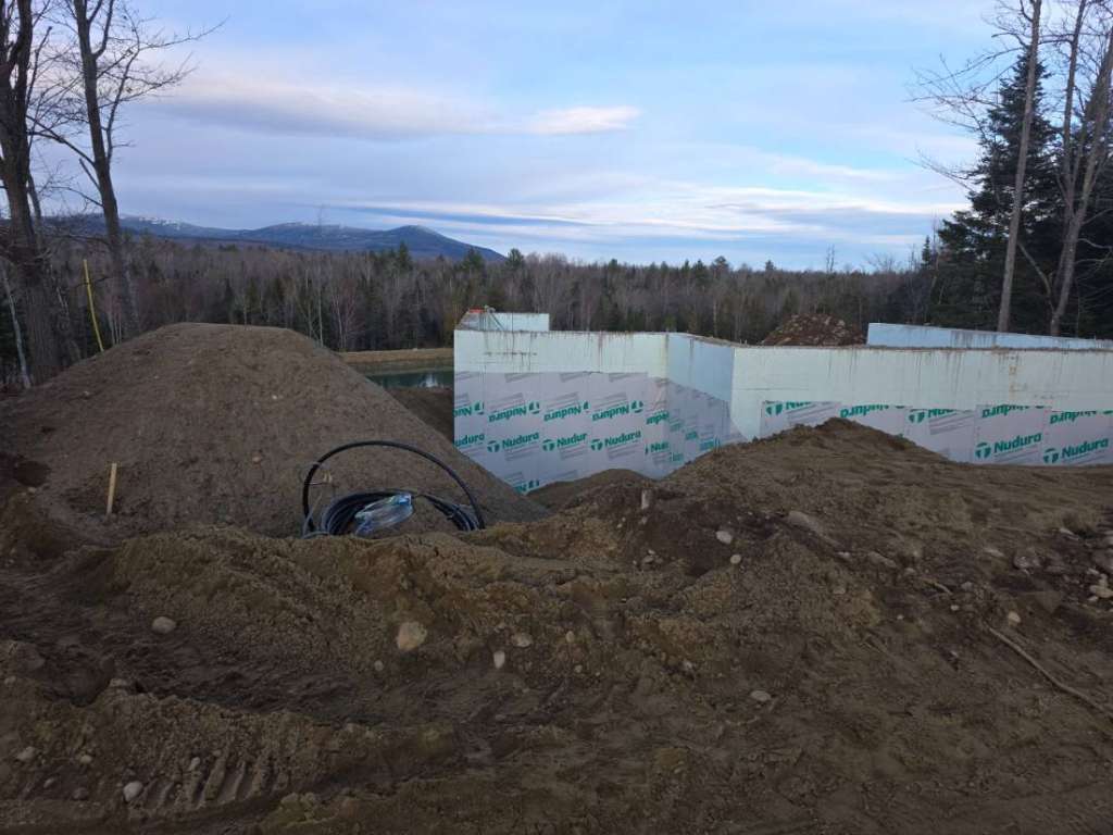 Foundation walls backfill winter construction phillips maine
