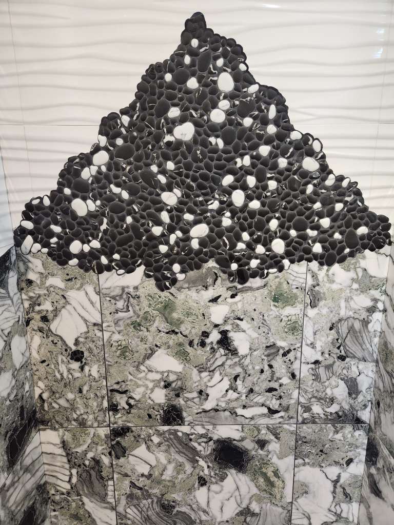 Custom pebble mosaic marble wall winter construction custom bathroom maine