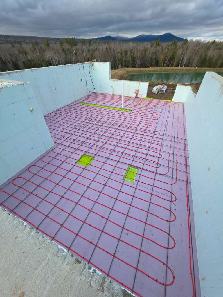 Radiant in floor heating install winter construction phillips maine