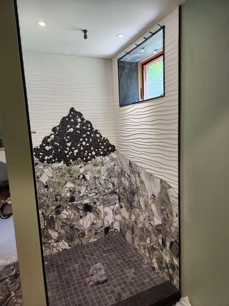 Textured feature tile window winter construction custom bathroom maine