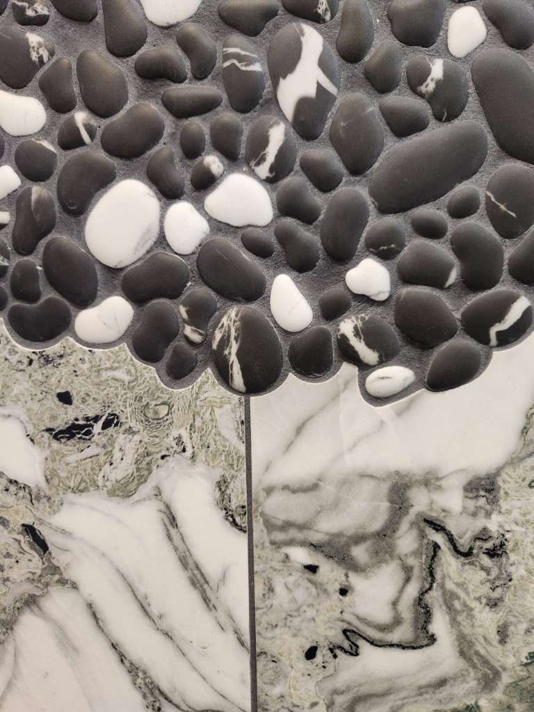 Pebble mosaic closeup winter construction custom bathroom maine