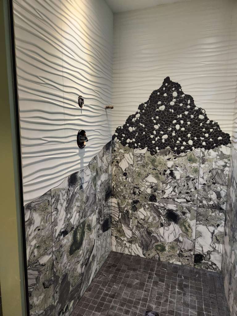 Wavy feature tile wall winter construction custom bathroom maine