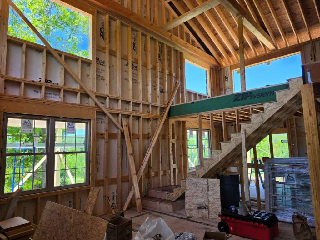 Interior framing great room winter construction phillips maine