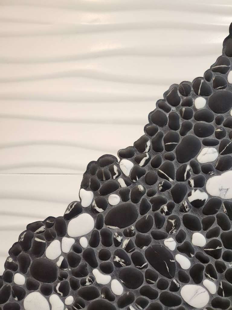 Black white pebble mosaic tile detail winter construction maine