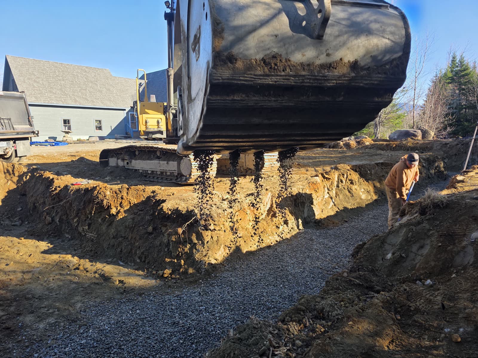 Gravel base going into the footings at a Winter Construction garage build in Western Maine