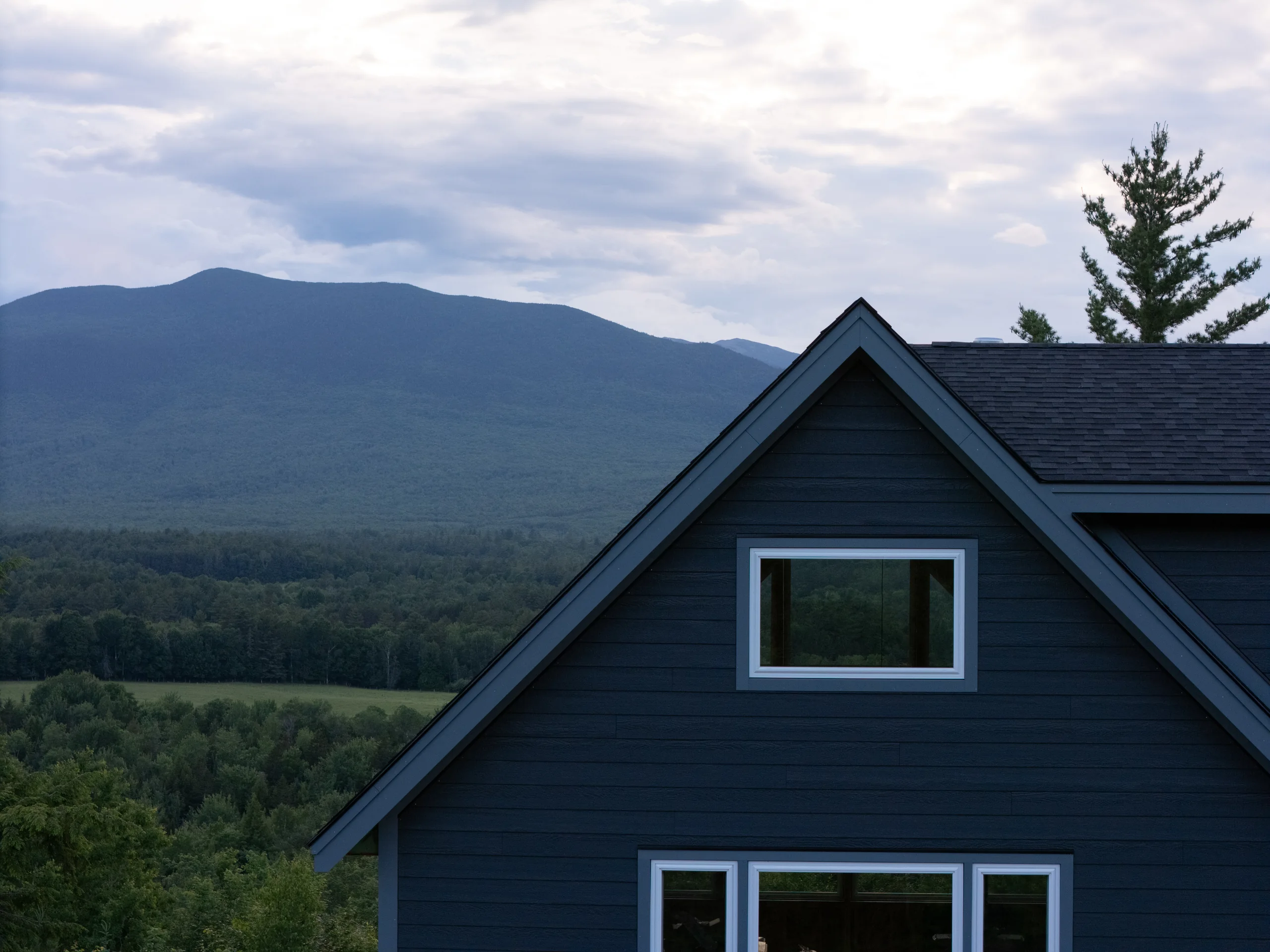 Services hero navy gable mountain view winter construction phillips maine