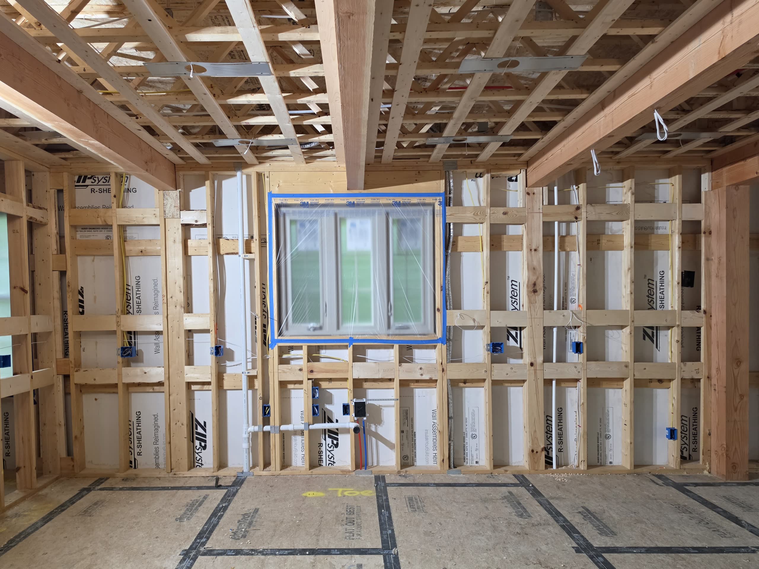 In-wall mechanical and electrical systems documented before insulation