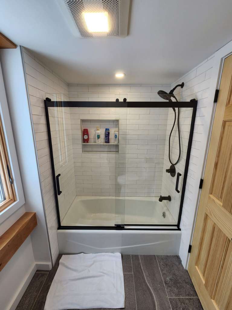 Finished glass tile shower winter construction bathroom remodel maine