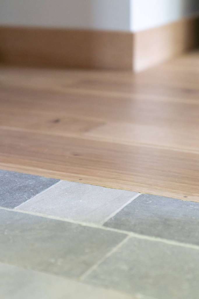 White oak stone tile floor detail winter construction phillips maine